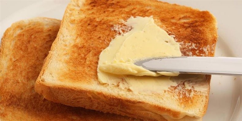 Imagem de Por que o pão sempre cai com a manteiga para baixo? A ciência explica! no site Mega Curioso