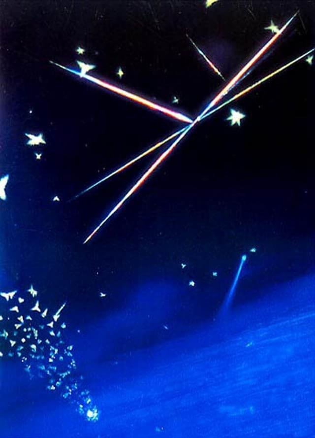 1977 – Cristaizinhos de rutilo e tridimita fotografados por James W. Smith, de Ohio, em um recipiente de vidro enriquecido por cobalto.