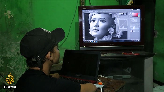 Conheça o trabalho do fotógrafo que não tem mãos nem pernas