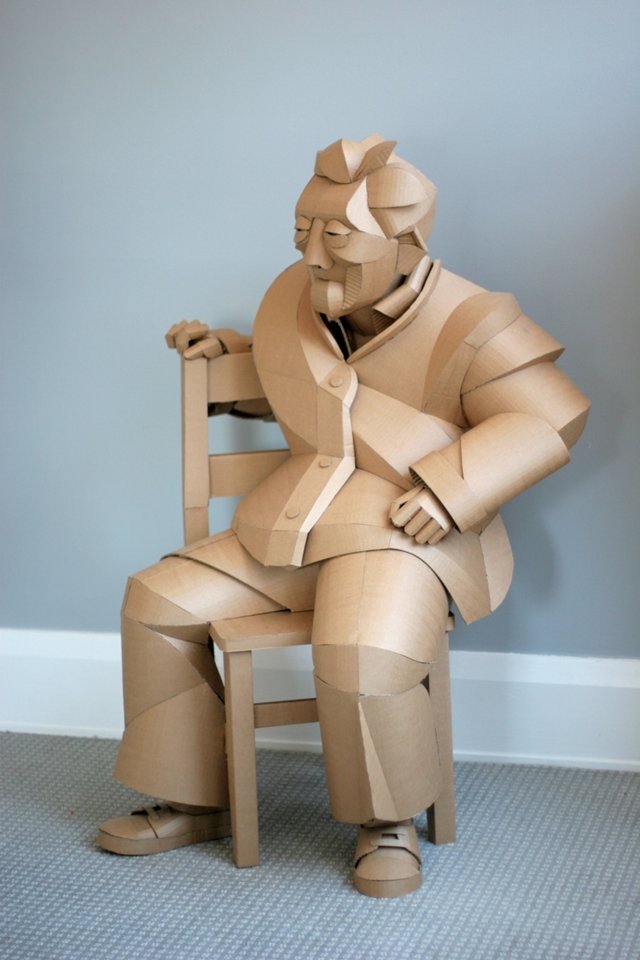 O artista que criou esculturas de cada um dos moradores da aldeia dos avós