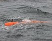 photograph-of-an-orange-long-rov-surfacing-in-choppy-grey-water-l.jpg